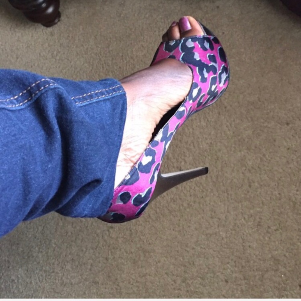 Aldo Cheetah print pink platform pumps.